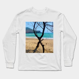 View through two curved pine tree trunks to a sand beach Long Sleeve T-Shirt